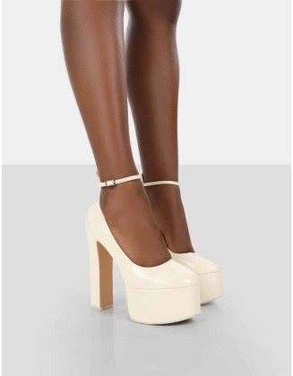 Donatella White Ankle Strap Closed Toe Platform Block Heels